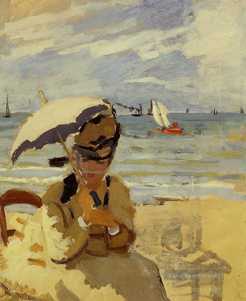 Camille Sitzen auf dem Strand bei Trouville Claude Monet Ölgemälde